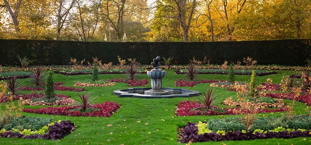 Boy and Frog statue in Queen Mary's Garden in autumn