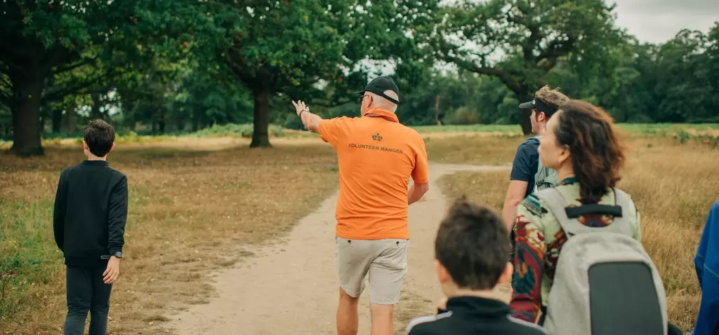 Volunteer Ranger takes people on a walk