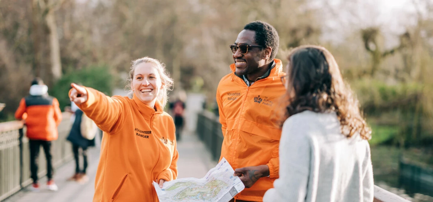 Volunteer Rangers pointing someone in the right direction