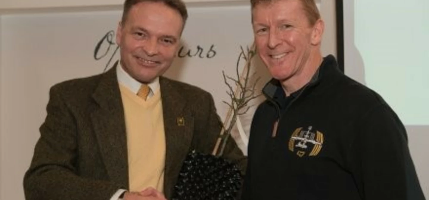 Bushy Park Assistant Park Manager Bill Swan holding the sapling with astronaut Tim Peake