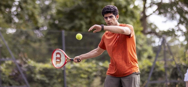 Man playing tennis at Park Sports Greenwich Park