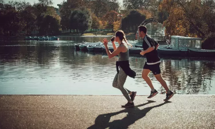 People running by the Serpentine in Hyde Park