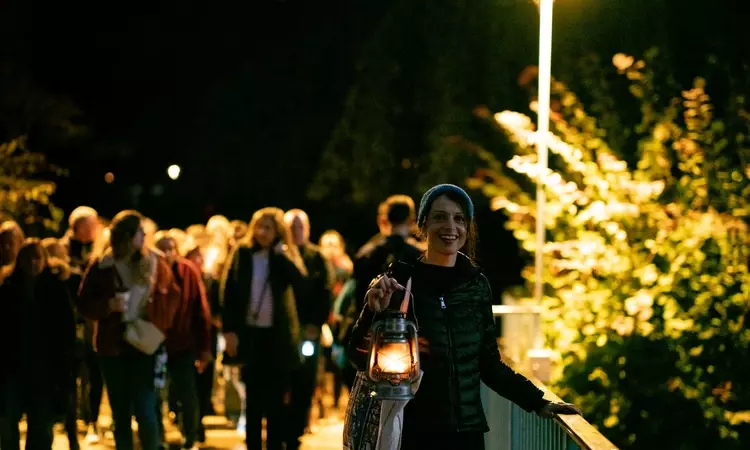 People attending dead after dark storytelling tour