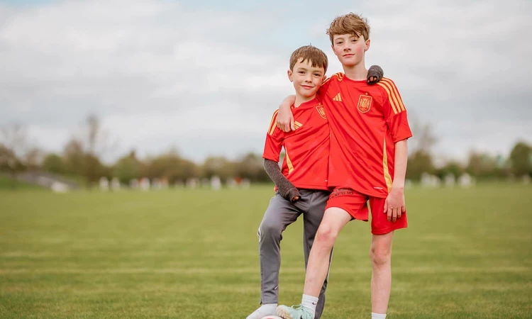 Two boys with a football