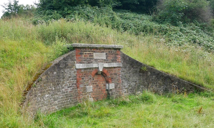 Conduit Head at the base of One Tree Hill - this looks like a curved wall of bricks emerging from a hillside