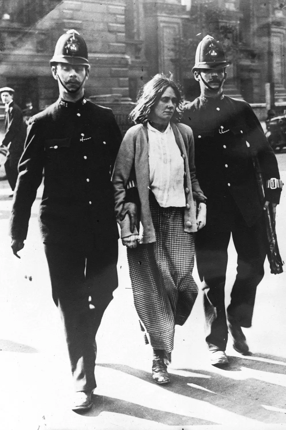 Police arrest a suffragette, 1914