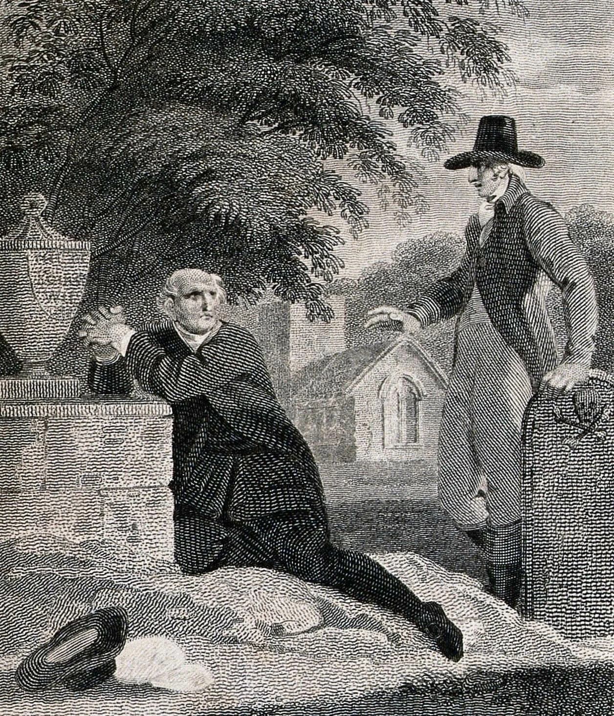 A man praying at a grave beneath a yew tree