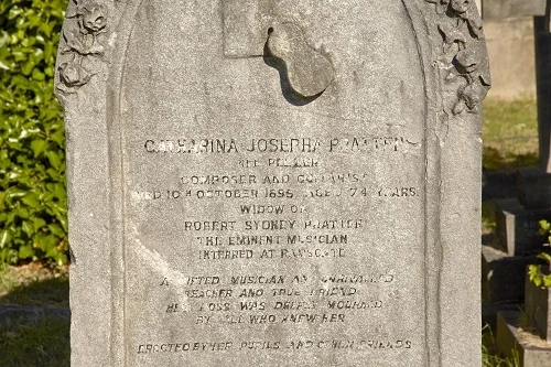 Guitar detail on Catharina Pratten’s grave