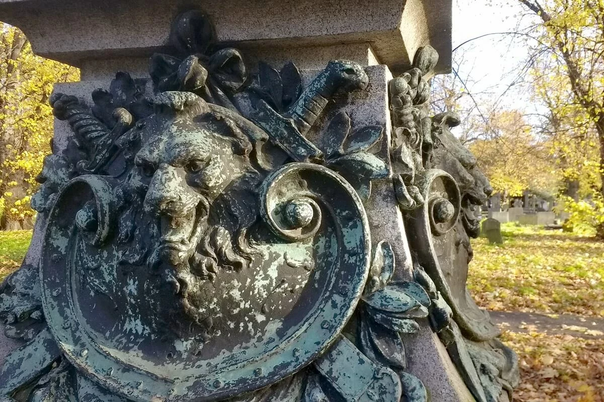 Lion masks surround the base of the monument. They traditionally symbolise courage and strength.