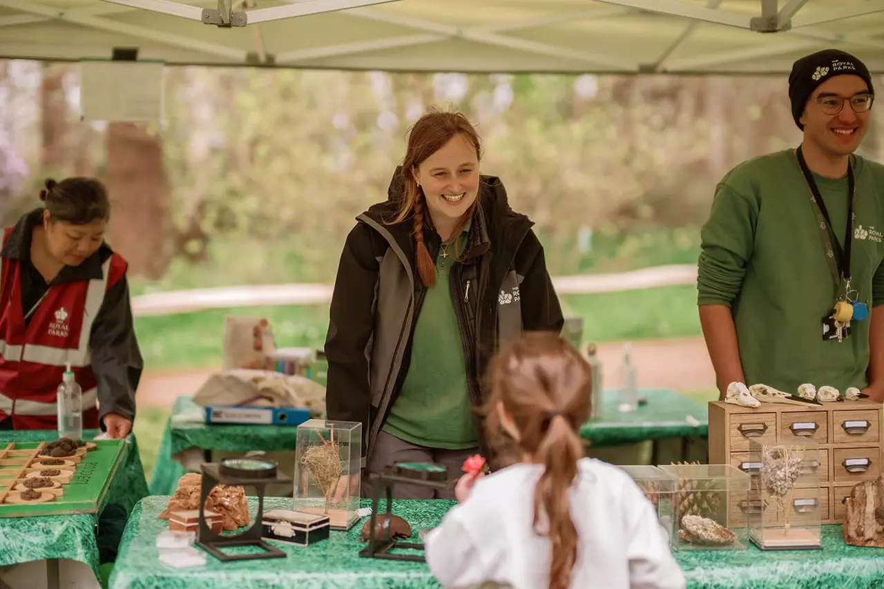 Members of the Help Nature Thrive team chatting to visitors