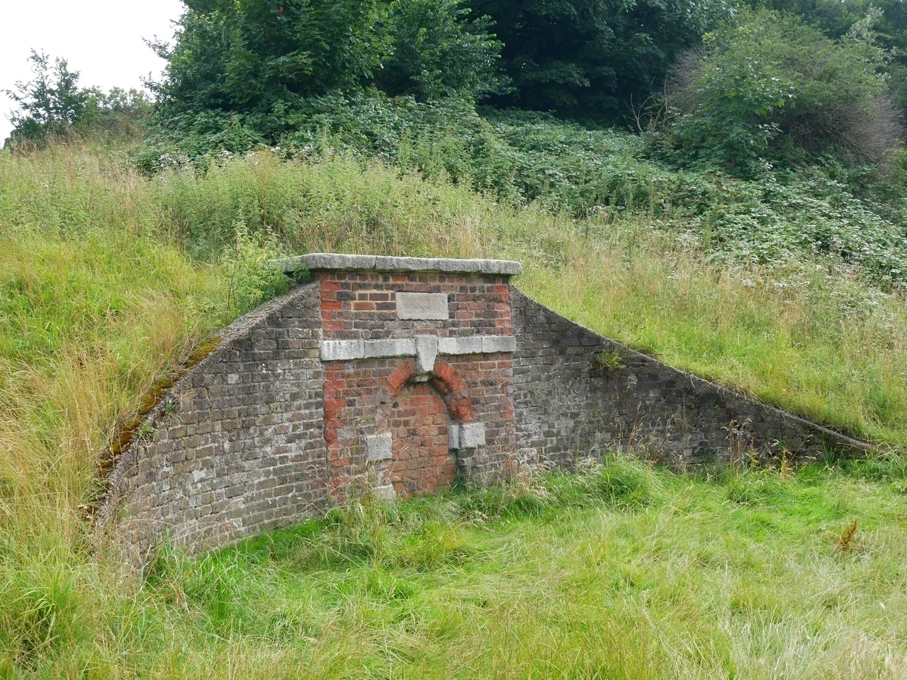 Conduit Head at the base of One Tree Hill - this looks like a curved wall of bricks emerging from a hillside